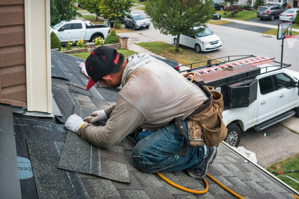 Professional Emergency Roof Repair technician working in Hampton, NE